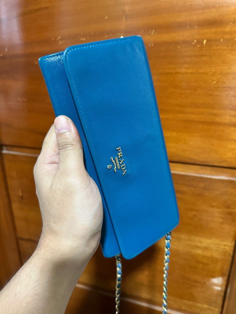 Prada wallet on chain (Category: Luxury Bags & Wallets) located in Makati City. Submitted by markussangabriel (Listing ID 1375625567, Image 3). Description: Good used condition..