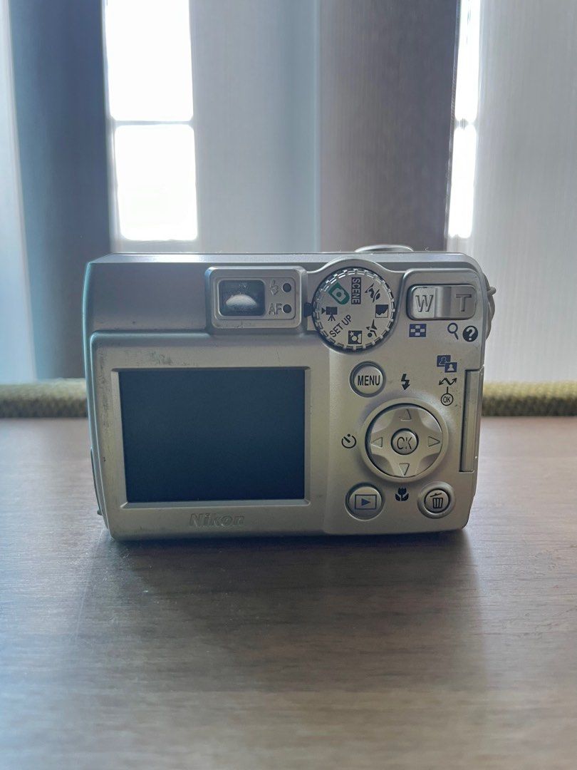 Rare Vintage Nikon Coolpix 4600 (Category: Cameras) located in Taguig. Submitted by hellokyky (Listing ID 1375519444, Image 2). Description: rare digital camera for REPAIR honest issue: battery door only (u can get it repaired, or just tape it to secure the battery door). everything else works, just need to worry about the battery door. i’ll include the double a batteries. if you are interested in seeing its video and pictures outputs just chat m