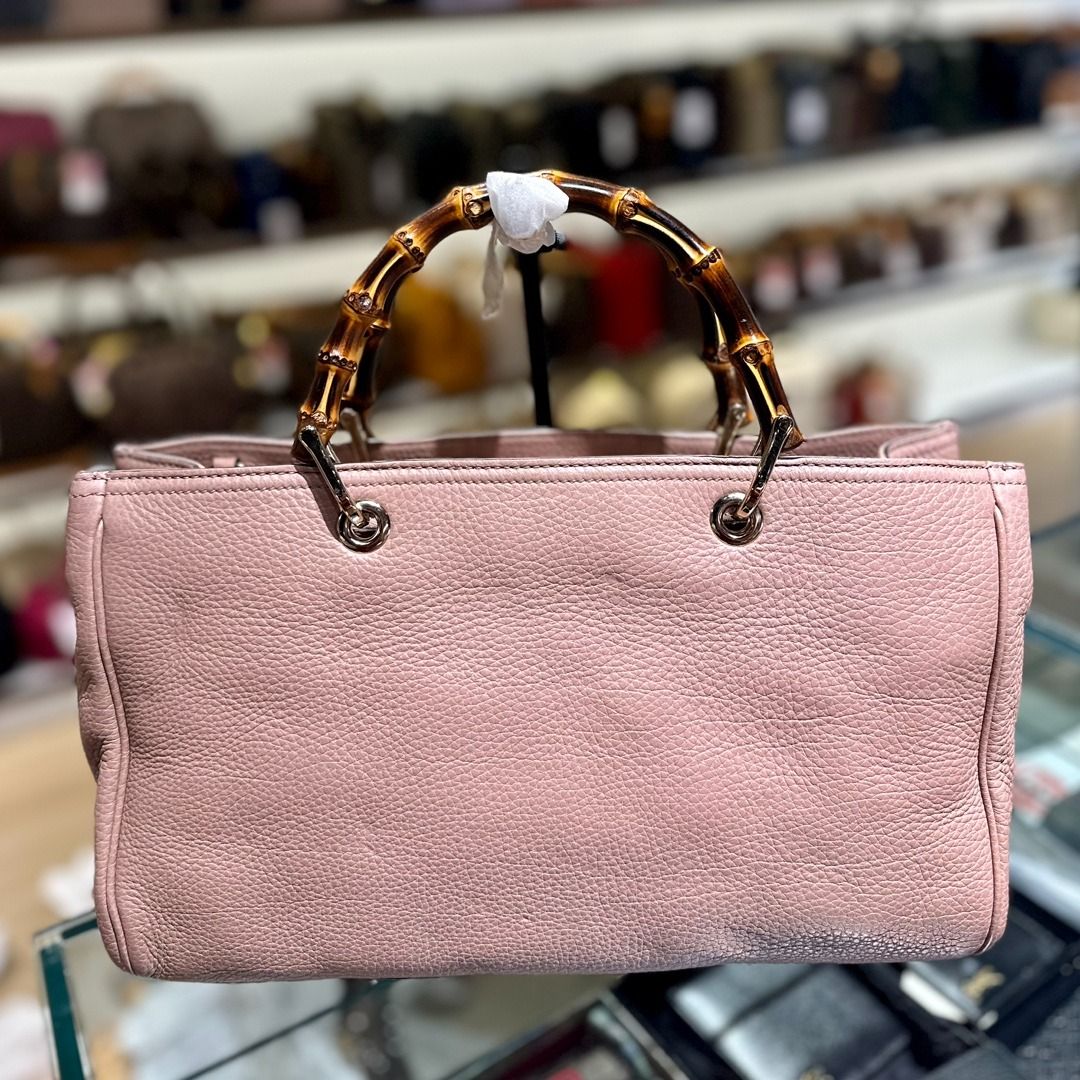 Reu 32371 Gucci - Bamboo Shopper Top Handle Bag with Strap (Category: Bags & Wallets) located in Singapore. Submitted by Reu_App (Listing ID 1375523715, Image 3). Description: Material: Calf Leather Color: Brown Size: 34 x 21 x 14cm Item is available to view at Singapore 🇸🇬 marina one #01-03 store S018935 WA: 81814221 for detailed photos or videos Check Reu App for grab pay, DBS installment or further markdown Tele & linktree: lcreustore.