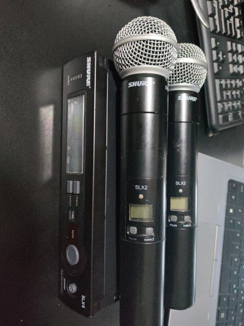 Shure SLX1 Wireless Microphone System (Category: Microphones) located in Singapore. Submitted by techdms (Listing ID 1375614712, Image 1). Description: Grab this Shure SLX1 wireless microphone system! It includes two handheld microphones and two bodypack transmitters with lavalier microphones. The receiver is also included. Ideal for presentations, performances, or any audio recording. Get yours today!.