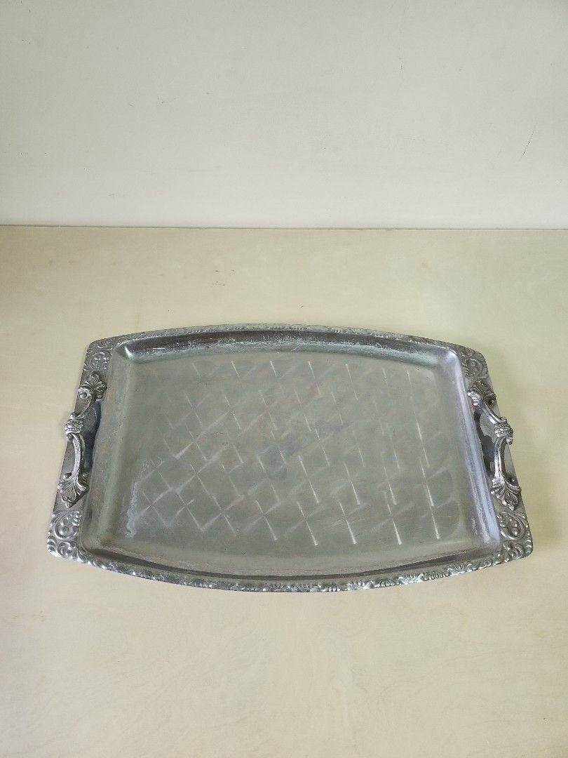 Mid century style stainless serving tray (Category: Other Kitchenware & Tableware) located in Quezon City. Submitted by prelovedisle.ph (Listing ID 1375472731, Image 1). Description: Preloved stainless serving tray. Wysiwyg. #stainlessservingtray #servingtray #tray #vintagetray #midcenturytray #midcentury.