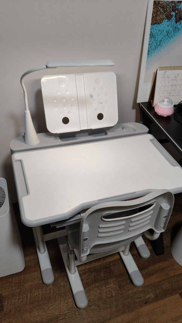 Study Table (Category: Tables & Sets) located in Singapore. Submitted by lklee.929 (Listing ID 1375559806, Image 1). Description: Child adjustable study table and chairs with led lamp. Slightly used..