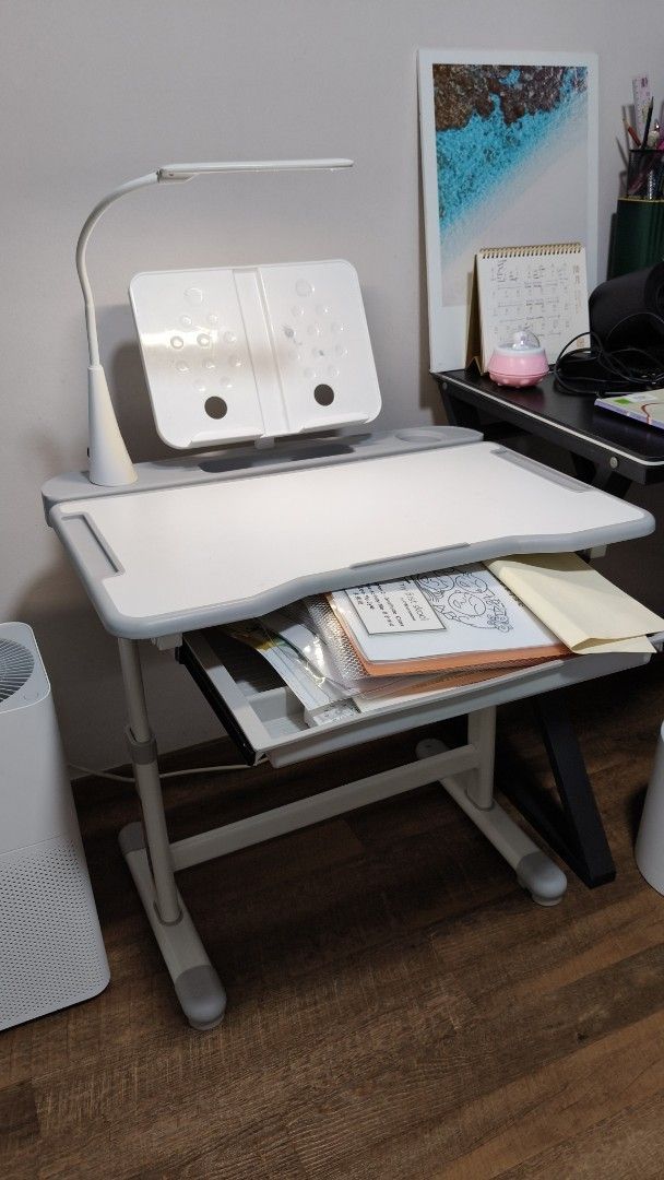 Study Table (Category: Tables & Sets) located in Singapore. Submitted by lklee.929 (Listing ID 1375559806, Image 3). Description: Child adjustable study table and chairs with led lamp. Slightly used..
