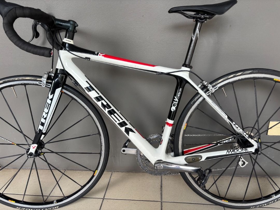 Trek Madone 4.7 Carbon Bicycle size 50, 7.23kg (Category: Bicycles) located in Singapore. Submitted by philipmehl (Listing ID 1372888835, Image 2). Description: High quality bike, brand as used by winning pro-team Lidl-Trek Professionally rebuilt from scratch, with new saddle, chain, bearings and wheels all trued up Perfect working order, and in great condition for its age, model year G / 2012 Amazing spec of Campagnolo, Dura Ace etc and with ped