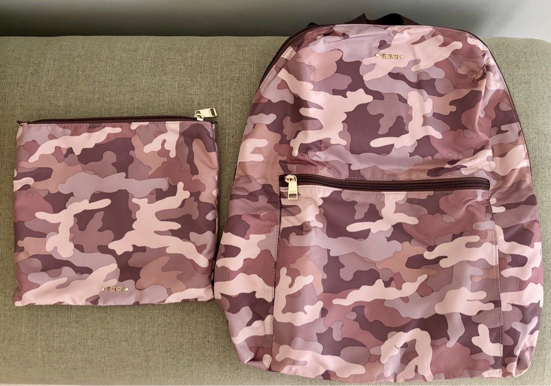 Sale! Almost new Tumi foldable backpack (Category: Luxury Bags & Wallets) located in Taguig. Submitted by museumile (Listing ID 1375609472, Image 1). Description: Authentic TUMI foldable travel backpack in canvas camouflage pink / gray. Lightweight & functional. Used 2x only , very clean inside & out. Comes with a pouch to place the folded backpack in. RFS: Not using anymore. Payment: BPI or Gcash. Shipping fee c/o buyer. .