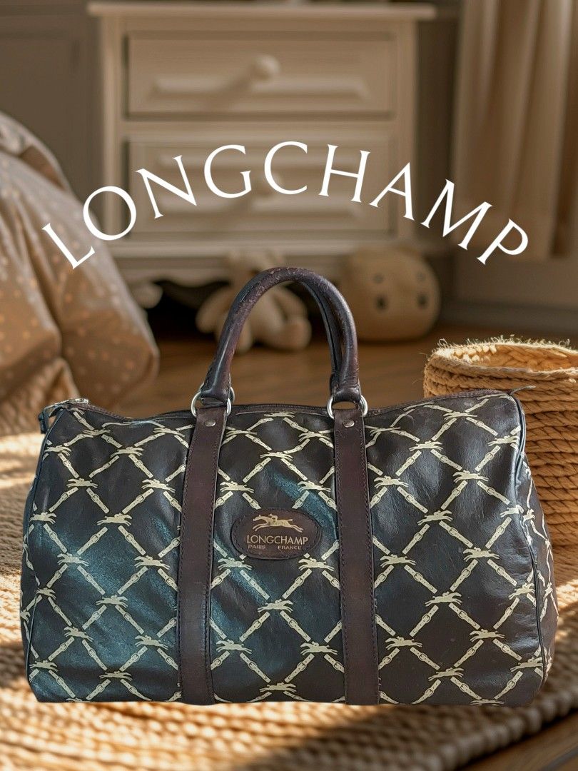 Vintage Longchamp Travel bag (Category: Luxury Bags & Wallets) located in Davao. Submitted by wengbagstuff (Listing ID 1375474366, Image 1). Description: ✅️ Vintage bag of 1980's ✅️ genuine leather ✅️ eclair zipper ✅️ w/ issues sa handle, needs twilly or repair ✅️ no open pipes, tiny cracks on lips but manageable..