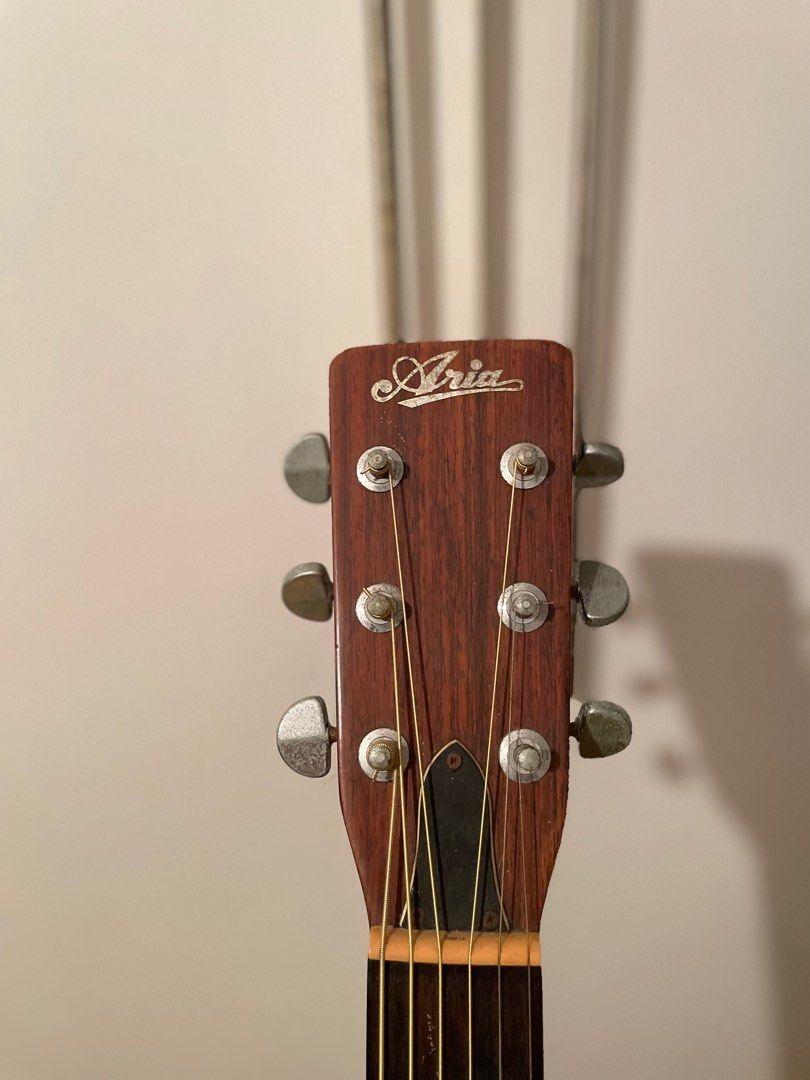 Acoustic Guitar (Category: Musical Instruments) located in Mandaluyong City. Submitted by cathyyy21 (Listing ID 1375797620, Image 2). Description: Comes with a bag, picks, and stand.