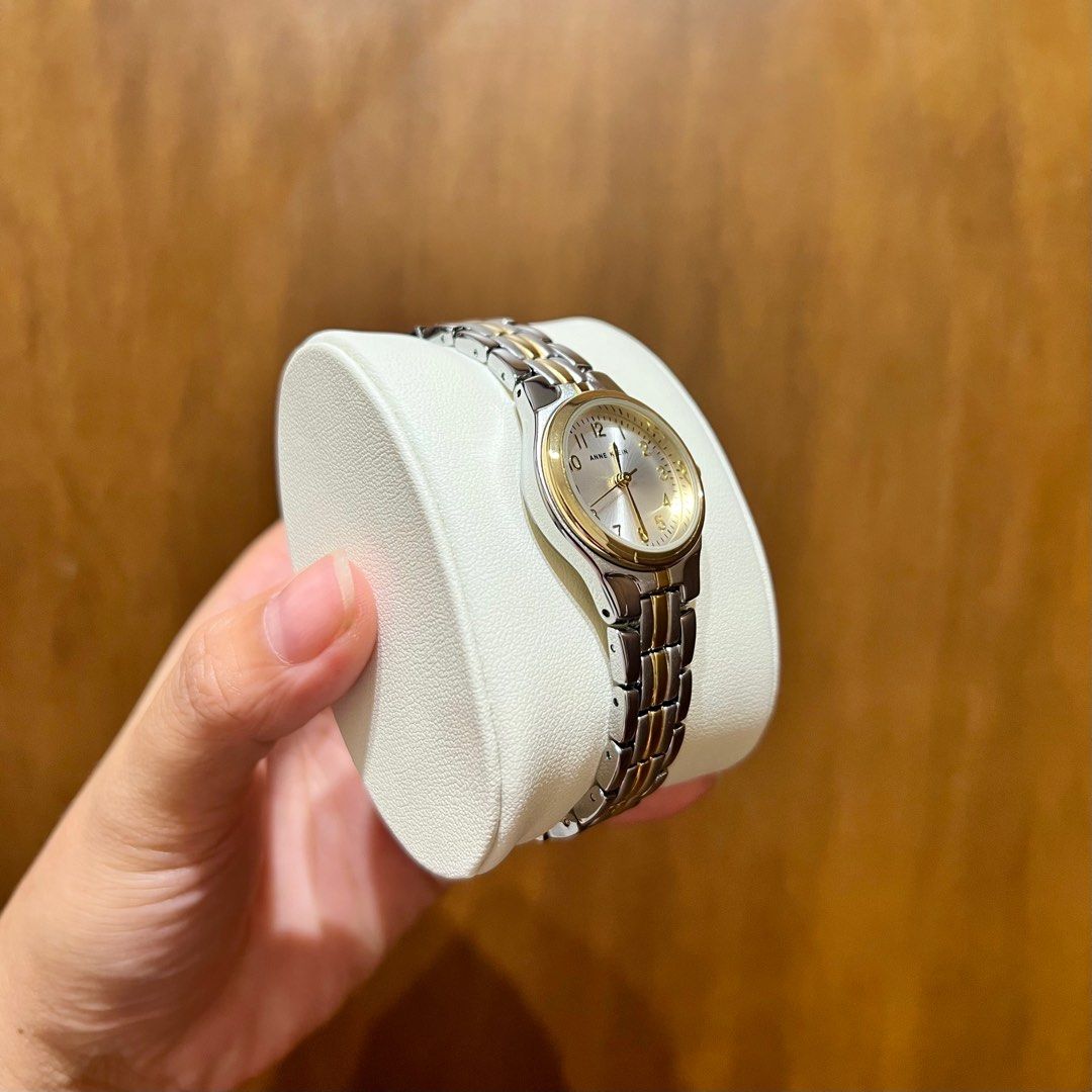 Anne Klein Two-Tone Dress Watch (Category: Women's Watches) located in Binan City. Submitted by labella.craze (Listing ID 1375774026, Image 2). Description: Details: ✅Mineral crystal lens: silver-tone dial with gold-tone easy-to-read Arabic numerals ✅Two-tone adjustable link bracelet; jewelry clasp and extender link Inner band circumference: 7 inches ✅Japanese quartz movement ✅Case diameter: 26 millimeters ✅Water resistant to 30 meters (99 feet):