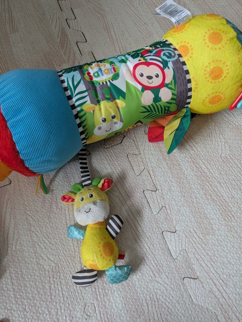 Assorted tummy time toys (Category: Infant Playtime) located in Manila. Submitted by usedfurnituremnl (Listing ID 1375660481, Image 3). Description: includes water mat, angled pillow and tummy time roller pillow. all purchased in Dec 2024.