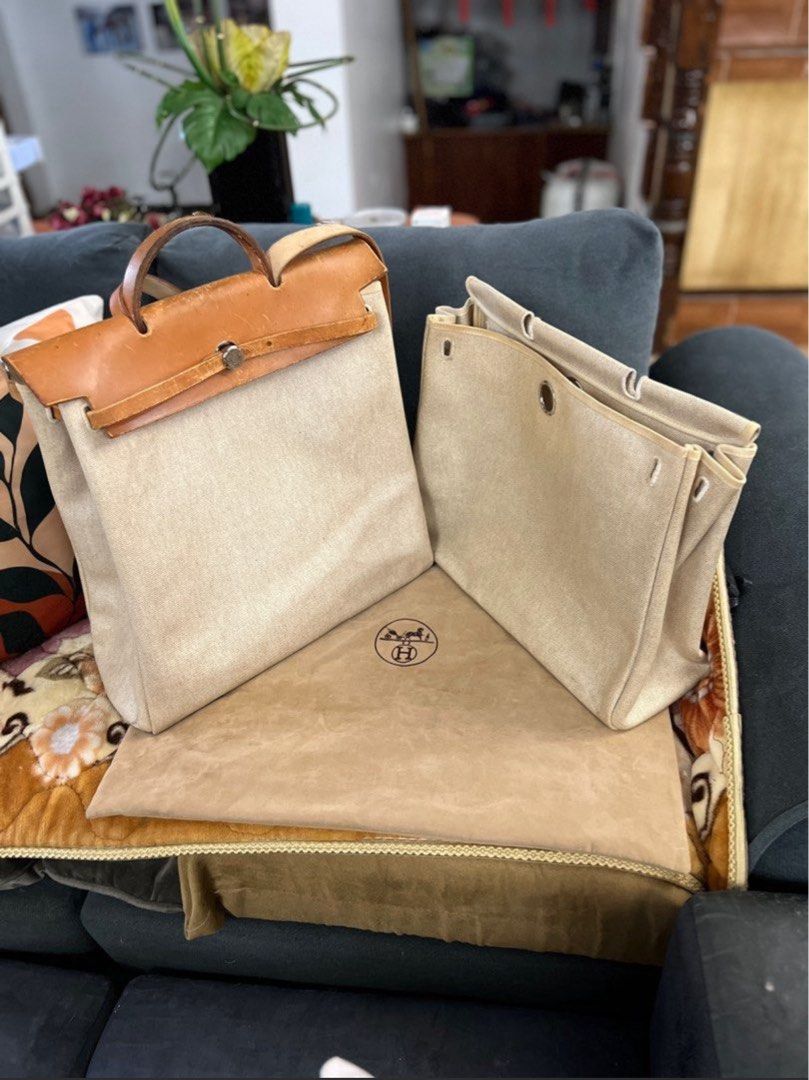 Authentic Hermes Herbag Travel Size (Category: Luxury Bags & Wallets) located in Paranaque City. Submitted by authentic_mj (Listing ID 1375832194, Image 1). Description: Authentic Hermes Herbag Travel Size Preloved Authentic from Japan w/ original sling w/ original replacement bag (smaller) w/ original dustbag Issue: No key leather hairlines - leather conditioner/ recolor dirt - needs cleaning.