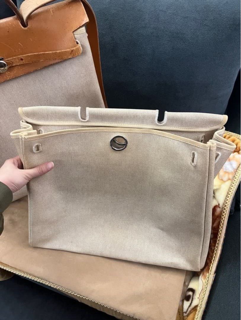 Authentic Hermes Herbag Travel Size (Category: Luxury Bags & Wallets) located in Paranaque City. Submitted by authentic_mj (Listing ID 1375832194, Image 2). Description: Authentic Hermes Herbag Travel Size Preloved Authentic from Japan w/ original sling w/ original replacement bag (smaller) w/ original dustbag Issue: No key leather hairlines - leather conditioner/ recolor dirt - needs cleaning.