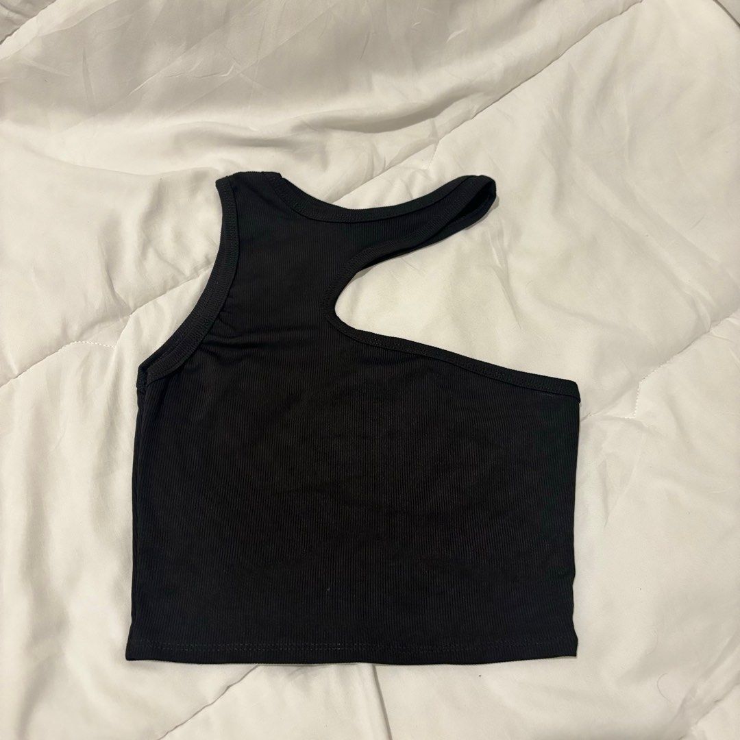 Black One shoulder top (Category: Sleeveless) located in Quezon City. Submitted by __declutterwithme (Listing ID 1375707233, Image 1). Description: PM for ww!.