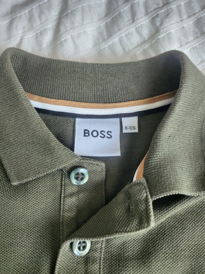 BOSS polo shirt (Category: Babies & Kids Fashion) located in Singapore. Submitted by antisober (Listing ID 1375694861, Image 2). Description: BOSS polo shirt in good condition. Please refer to the photos for size..