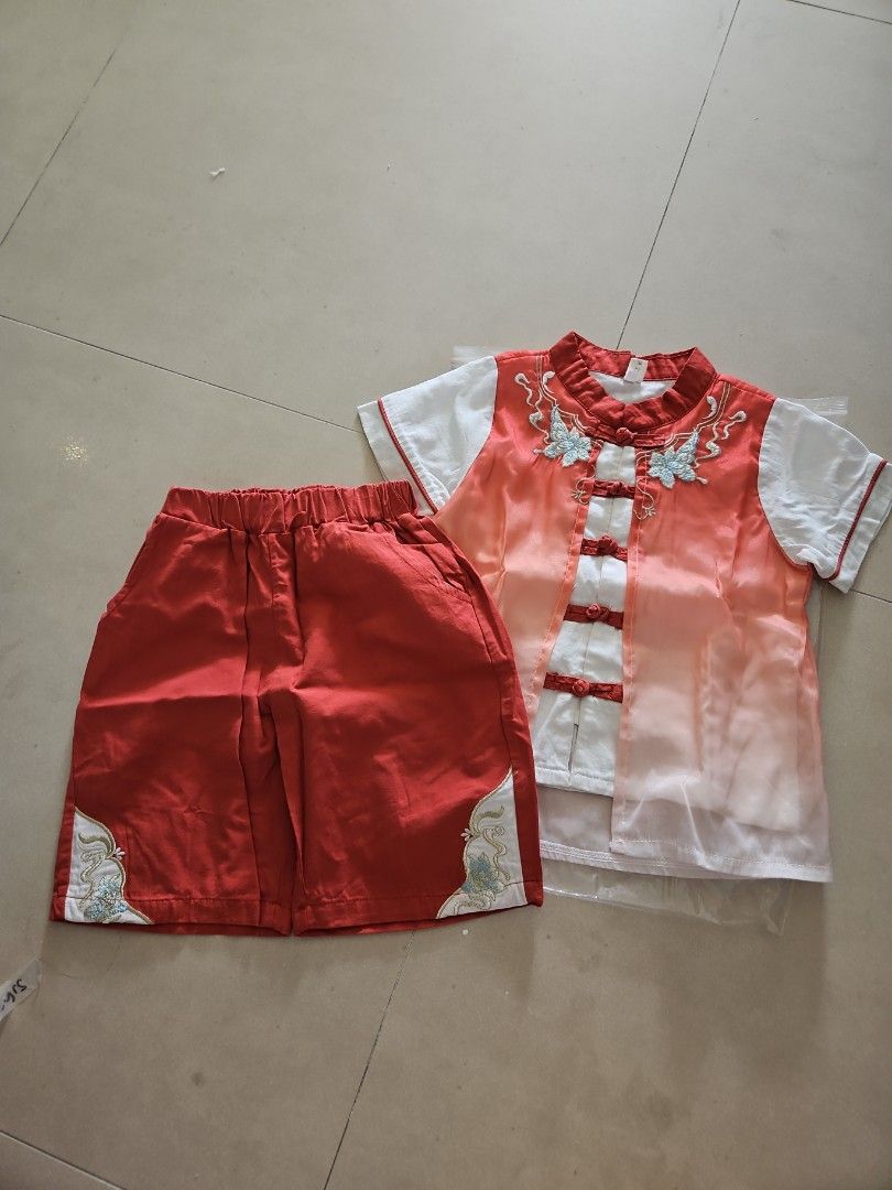 Chinese Costume / CNY Costume / New Year Costume (Category: Babies & Kids Fashion) located in Singapore. Submitted by junekathy (Listing ID 1375681458, Image 1). Description: Size 110, only worn 1 time Self collect at S560301 Top $2.50 for mailing.