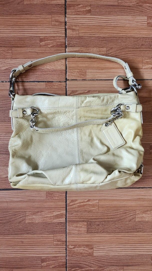 Coach Hobo Cream Leather Shoulder Bag (Category: Luxury Bags & Wallets) located in Quezon City. Submitted by ag_2016 (Listing ID 1375713236, Image 2). Description: Vintage Model: Coach - G0093-14199 18" shoulder Strap Yellow From US Excellent Quality No Flaws, Yellow leather Inside is very clean.