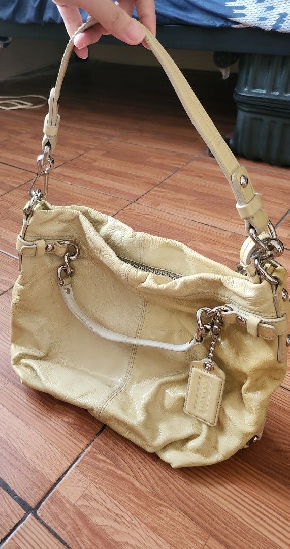 Coach Hobo Cream Leather Shoulder Bag (Category: Luxury Bags & Wallets) located in Quezon City. Submitted by ag_2016 (Listing ID 1375713236, Image 1). Description: Vintage Model: Coach - G0093-14199 18" shoulder Strap Yellow From US Excellent Quality No Flaws, Yellow leather Inside is very clean.