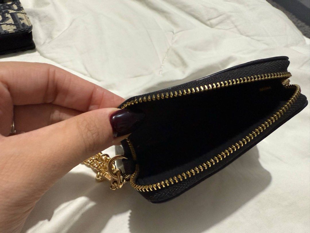 Coach Wallet (Category: Luxury Bags & Wallets) located in Malolos. Submitted by 3cyclothing (Listing ID 1375797654, Image 2). Description: Selling my preloved Coach zip card wallet - Orig Coach bought from Canada - Small and compact - Multiple card slots - Zippered pocket - Clear ID window issue: medyo rusted (last pic attached) mop: gcash/bank transfer mod: j&t/flash/lalamove.