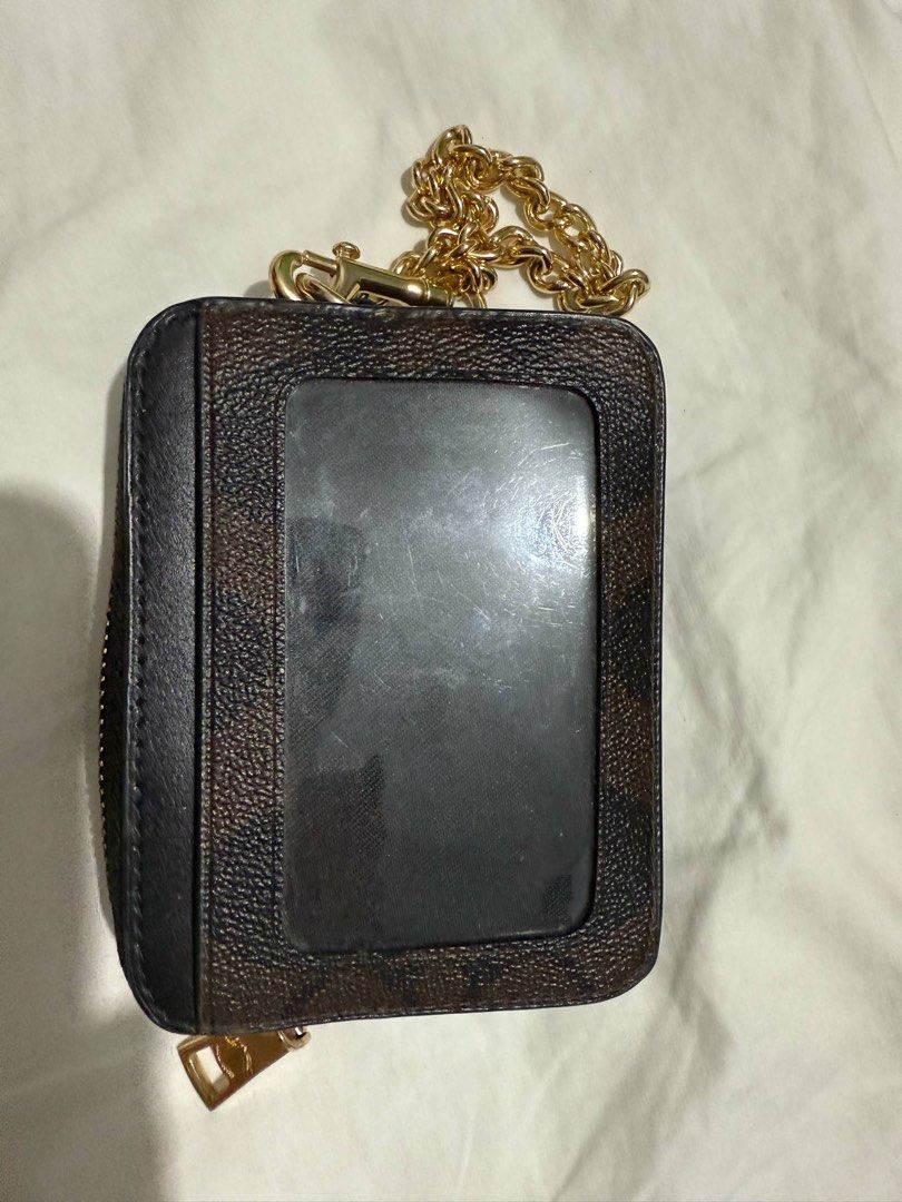 Coach Wallet (Category: Luxury Bags & Wallets) located in Malolos. Submitted by 3cyclothing (Listing ID 1375797654, Image 3). Description: Selling my preloved Coach zip card wallet - Orig Coach bought from Canada - Small and compact - Multiple card slots - Zippered pocket - Clear ID window issue: medyo rusted (last pic attached) mop: gcash/bank transfer mod: j&t/flash/lalamove.