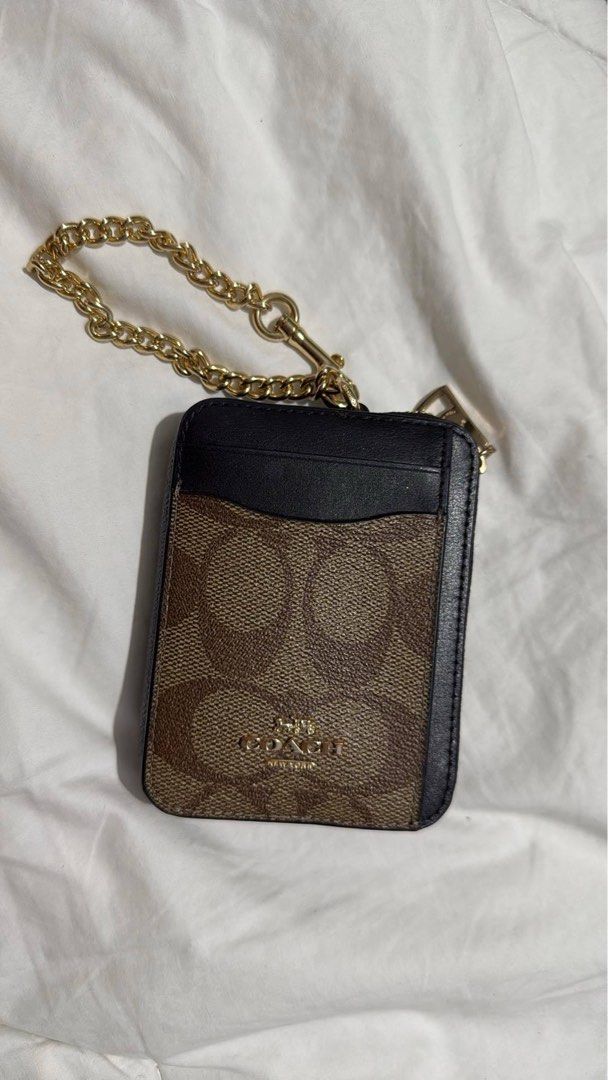 Coach Wallet (Category: Luxury Bags & Wallets) located in Malolos. Submitted by 3cyclothing (Listing ID 1375797654, Image 1). Description: Selling my preloved Coach zip card wallet - Orig Coach bought from Canada - Small and compact - Multiple card slots - Zippered pocket - Clear ID window issue: medyo rusted (last pic attached) mop: gcash/bank transfer mod: j&t/flash/lalamove.