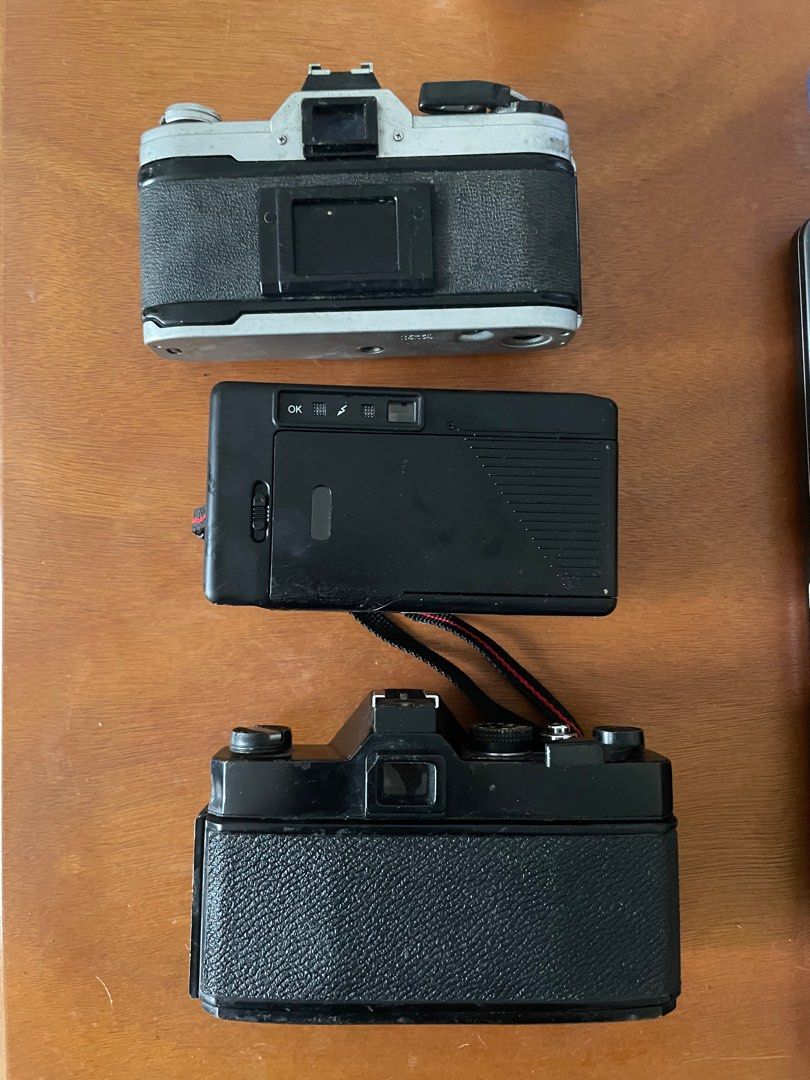 film camera bundle (UNTESTED) (Category: Cameras) located in Quezon City. Submitted by bentelogue (Listing ID 1375713182, Image 2). Description: bundle of 2 thrifted film cams, for parts or repair. untested. buy at your own risk. SEARS TLS 1000 MXB Canon AE-1 (sold) Halina 1950 TL.