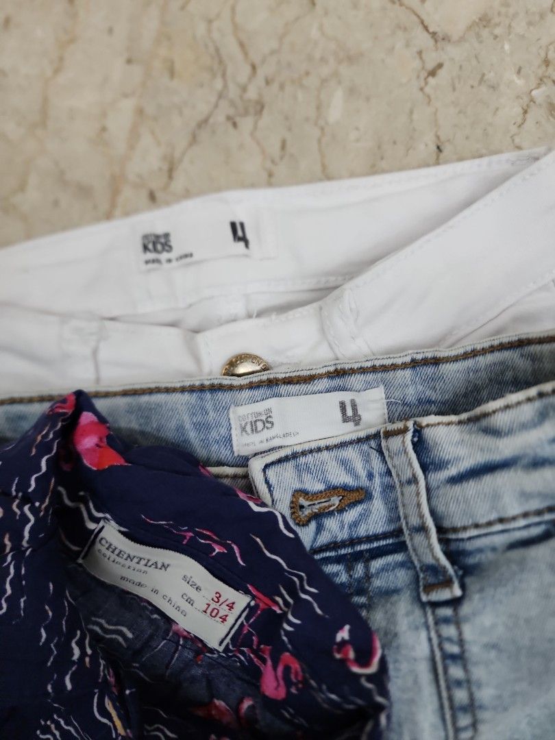 Girls' Outfit bundle $10 (Category: Babies & Kids Fashion) located in Singapore. Submitted by dec_belle (Listing ID 1375790107, Image 2). Description: preloved Girls' clothing bundle: Flamingo print shirt & 2 pairs of denim shorts (light wash & white). size 4. good condition..