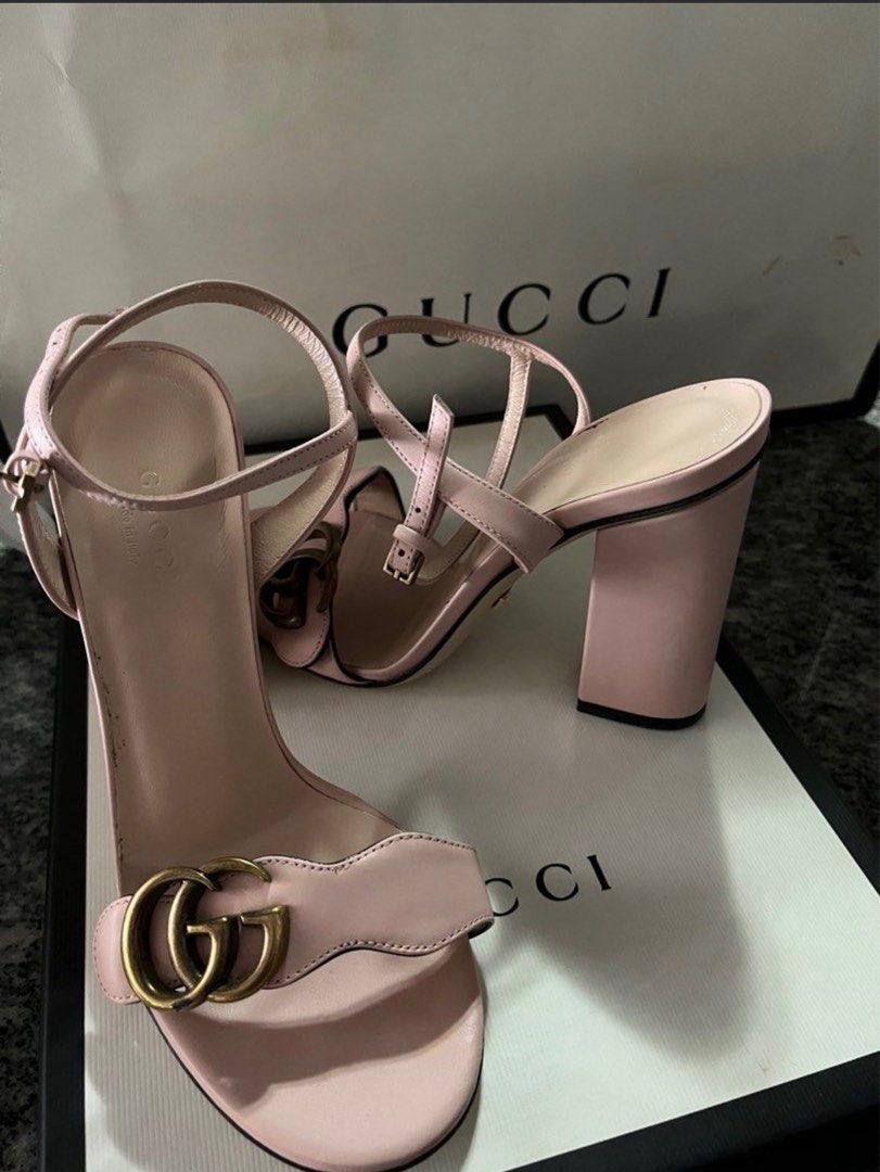 GUCCI authentic sling sandals (Category: Sneakers & Footwear) located in Quezon City. Submitted by ecb0103 (Listing ID 1375676705, Image 1). Description: A= Size 35 Authentic Gucci Pink Leather • Adjustable ankle strap • Double G • High-heel • 4.1" heel • Made in Italy Complete with bag, box and paper bag Used as a wedding shoes Used couple of times, cobblestone and farm wedding hence the marks on the sole. In very good condition, smells new leat