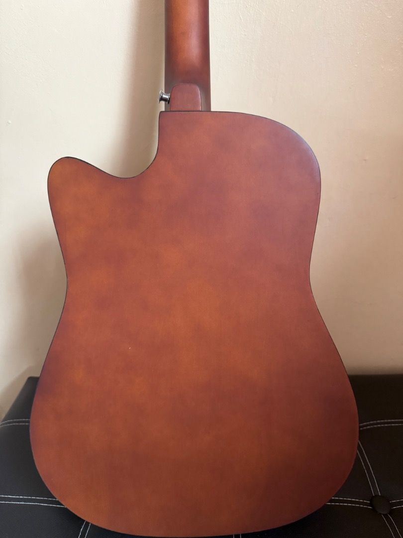 Guitar for sale (Category: Musical Instruments) located in Valenzuela. Submitted by gsapla (Listing ID 1375723770, Image 3). Description: Slick 38' inches colorful acoustic guitar with trussrod (Brown) RFS: Barely used FREEBIES: -Guitar Bag -Capo -Strap -guitar pick Meetup: Valenzuela area or Marilao only Shipping: thru Lalamove, buyer to handle sf, pay half before shipping.