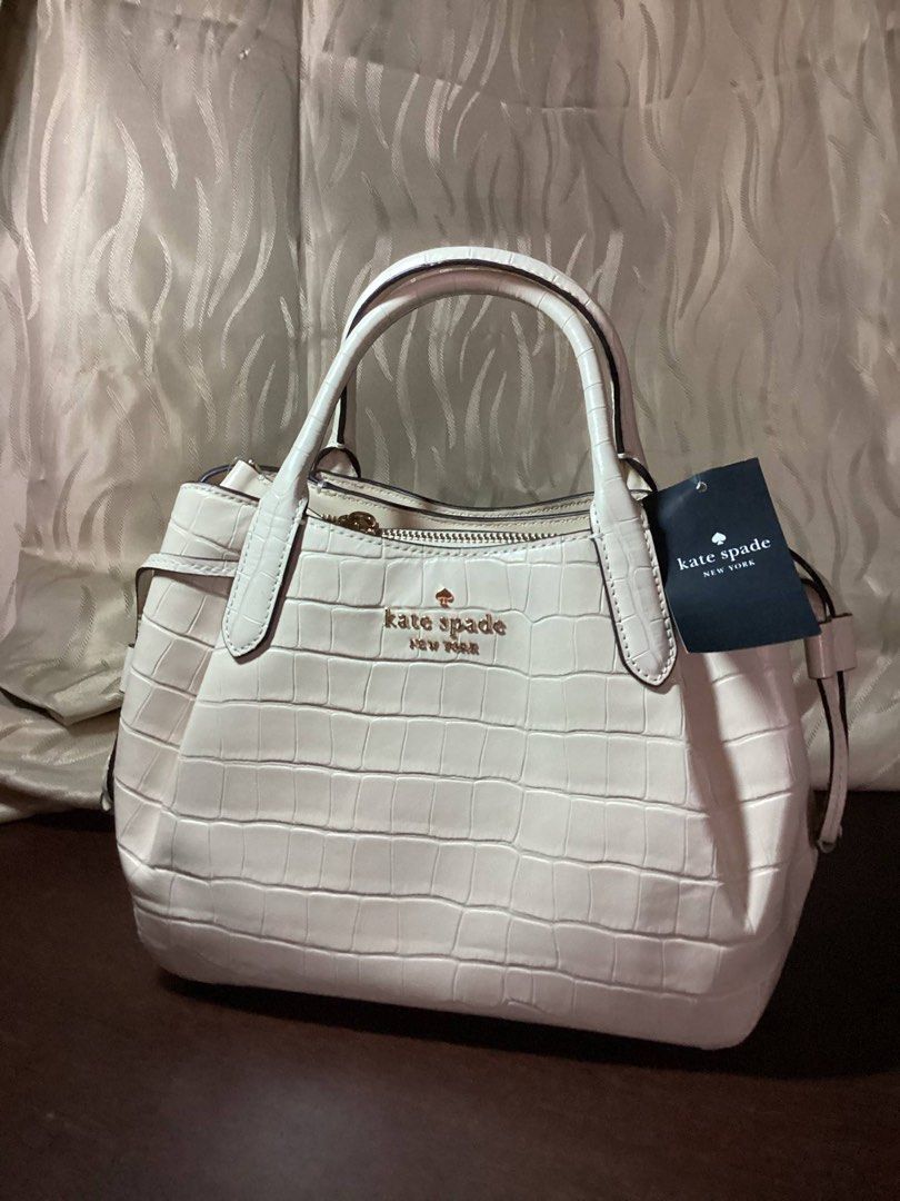 Kate Spade Dumpling Croco Embossed [Brand New] (Category: Luxury Bags & Wallets) located in Las Pinas. Submitted by yamsy (Listing ID 1375288396, Image 2). Description: Meetup: Vito Cruz/Sm Southmall Loc: Las Pinas City Kate Spade Color: Bare Details: Croco Embossed Style: Flip Crossbody/Handbag - Nego (if sure buyer) - Brand New - From US (No box, dust bag only included) - Authentic 100% .