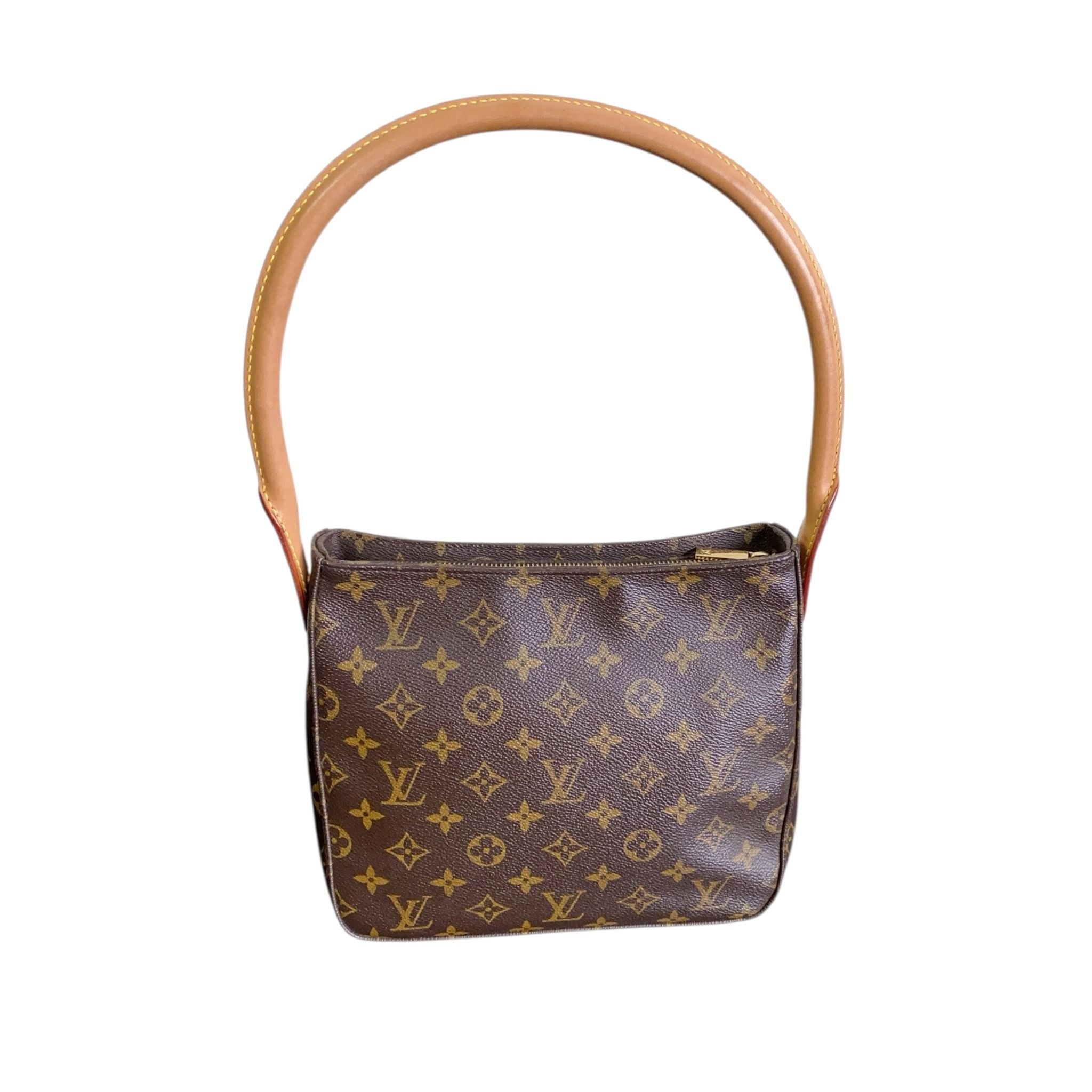 Louis Vuitton Vintage Looping in Monogram (Category: Bags & Wallets) located in Singapore. Submitted by projectlfg (Listing ID 1375768465, Image 1). Description: Louis Vuitton Vintage Looping in Monogram Condition 98% New. Year: FL0072 Accessories: - Size: 24x10x21 / SGD: 777 / 1352980 • ACRA Registered Company in Singapore • Physical Outlets in Singapore and China • Entrupy Verified Business • Authenticity Guaranteed • Worldwide Shipping We ensu