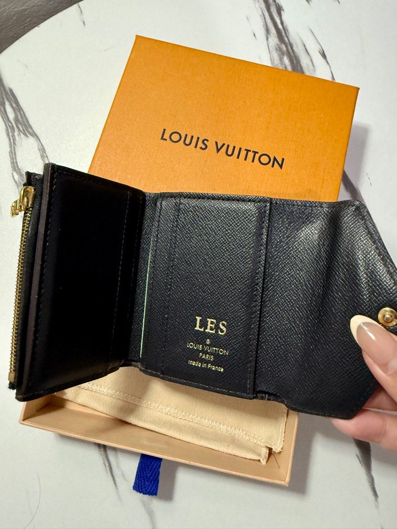 LV Zoe Wallet (Category: Luxury Bags & Wallets) located in Las Pinas. Submitted by mjessicaya (Listing ID 1375653684, Image 3). Description: Zoé Monogram Reverse Giant Canvas Bought: 2022 at Solaire, Manila Inclusion: box, dustbag with engraving “LES” .