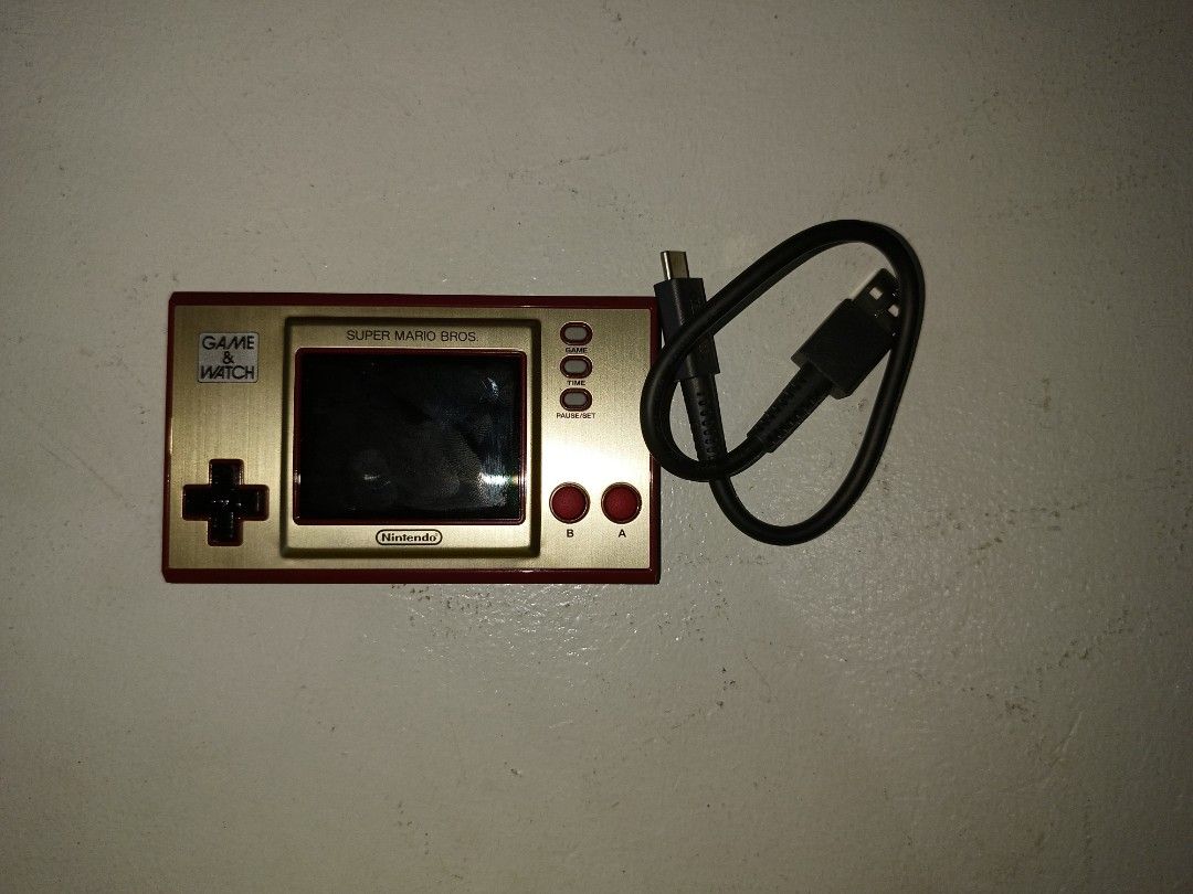 NINTENDO GAME AND WATCH (Category: Nintendo) located in Manila. Submitted by simplezhelskie (Listing ID 1375751806, Image 1). Description: BARELY USED AND WORKING. CHARGER INCLUDED (TYPE C).