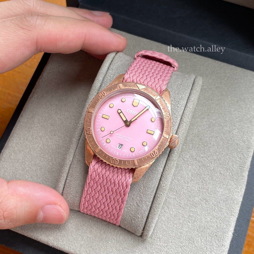 Oris Divers Sixty-Five 65 - Bronze Pink Dial “Cotton Candy” - 38mm (Category: Luxury Watches) located in Quezon City. Submitted by TheWatchAlley (Listing ID 1375763177, Image 1). Description: Pre-owned Oris Divers Sixty-Five 65 - Bronze Pink Dial “Cotton Candy” - 38mm Php 68,800 - watch and oris inner box only - with 2 pink perlon straps (1 long for big wrists and 1 short for small wrists) - 9/10 watch head condition Ref. 01 733 7771 3158-07 3 19