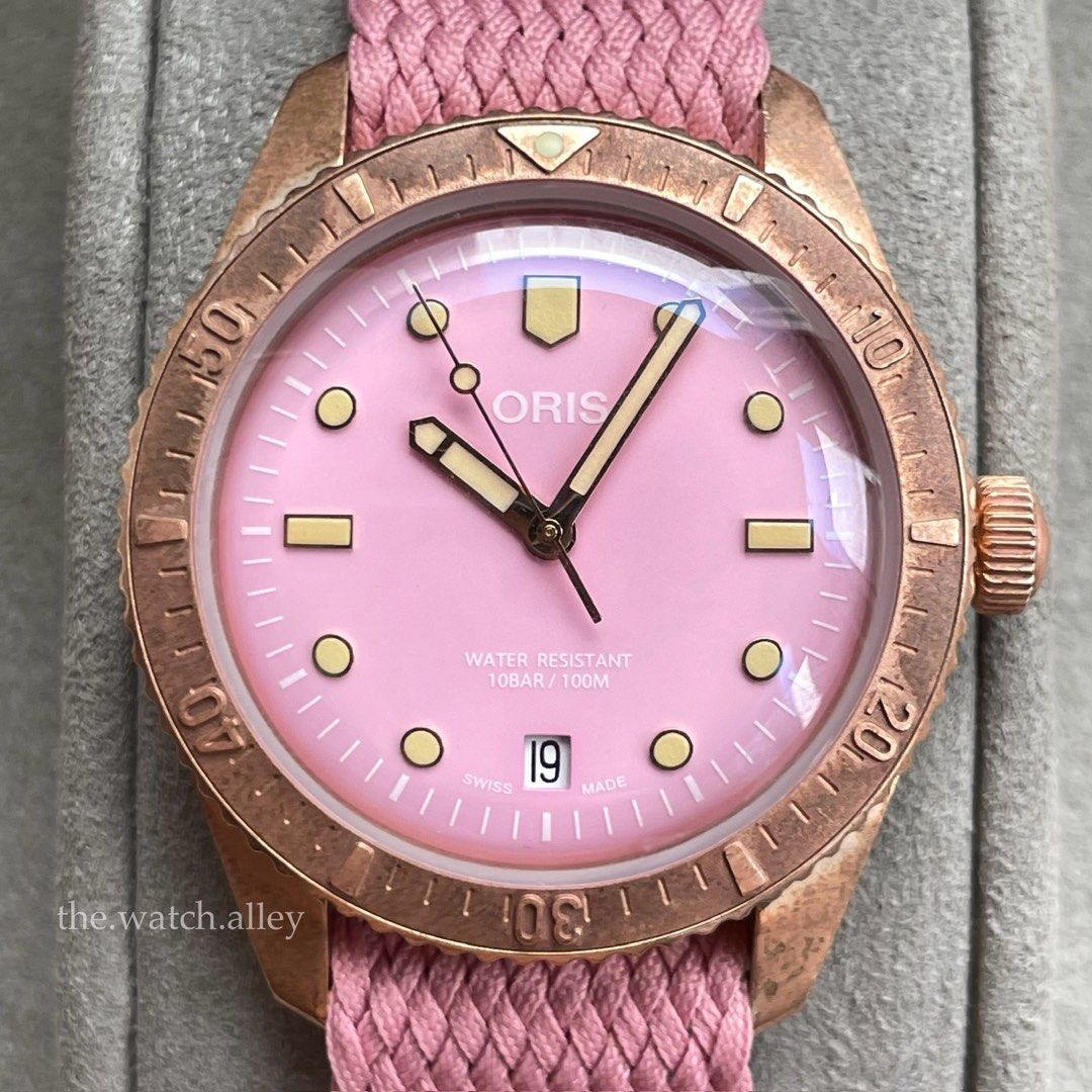 Oris Divers Sixty-Five 65 - Bronze Pink Dial “Cotton Candy” - 38mm (Category: Luxury Watches) located in Quezon City. Submitted by TheWatchAlley (Listing ID 1375763177, Image 2). Description: Pre-owned Oris Divers Sixty-Five 65 - Bronze Pink Dial “Cotton Candy” - 38mm Php 68,800 - watch and oris inner box only - with 2 pink perlon straps (1 long for big wrists and 1 short for small wrists) - 9/10 watch head condition Ref. 01 733 7771 3158-07 3 19