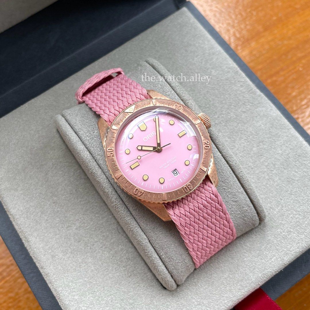 Oris Divers Sixty-Five 65 - Bronze Pink Dial “Cotton Candy” - 38mm (Category: Luxury Watches) located in Quezon City. Submitted by TheWatchAlley (Listing ID 1375763177, Image 3). Description: Pre-owned Oris Divers Sixty-Five 65 - Bronze Pink Dial “Cotton Candy” - 38mm Php 68,800 - watch and oris inner box only - with 2 pink perlon straps (1 long for big wrists and 1 short for small wrists) - 9/10 watch head condition Ref. 01 733 7771 3158-07 3 19