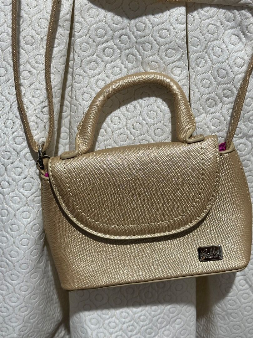 Robby Rabbit Sling Bag (Category: Babies & Kids Fashion) located in Mandaluyong City. Submitted by soleil16 (Listing ID 1375837643, Image 1). Description: Used twice. Bought it for P800 at SM Store.
