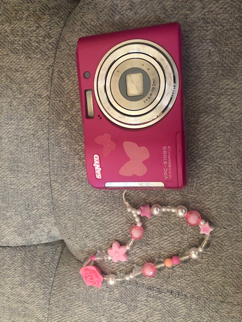 Sanyo VPC pink digi cam (Category: Other Gadgets) located in Marikina City. Submitted by declutterwcyz (Listing ID 1375699963, Image 1). Description: Originally bought for 2500 Need to sell as im moving to another country wont be able to bring This digi cam has issues but works well - Battery door is damaged ( i use tape to secure electrical tape is much more advisable to use ) - lcd burn and may umbok sa screen ( doesnt affect outputs) - buttons