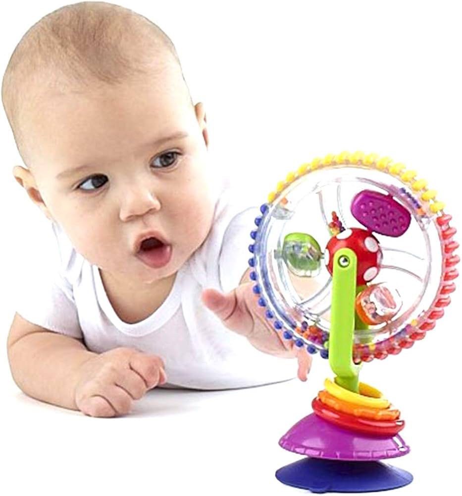 Sassy Wonder wheel activity toy (Category: Infant Playtime) located in Cainta. Submitted by mochimochiko (Listing ID 1375797937, Image 3). Description: Sassy Wonder Wheel Activity Toy, a developmental toy designed for babies aged 6 months and up. With Suction for high chairs, floor, or table. .