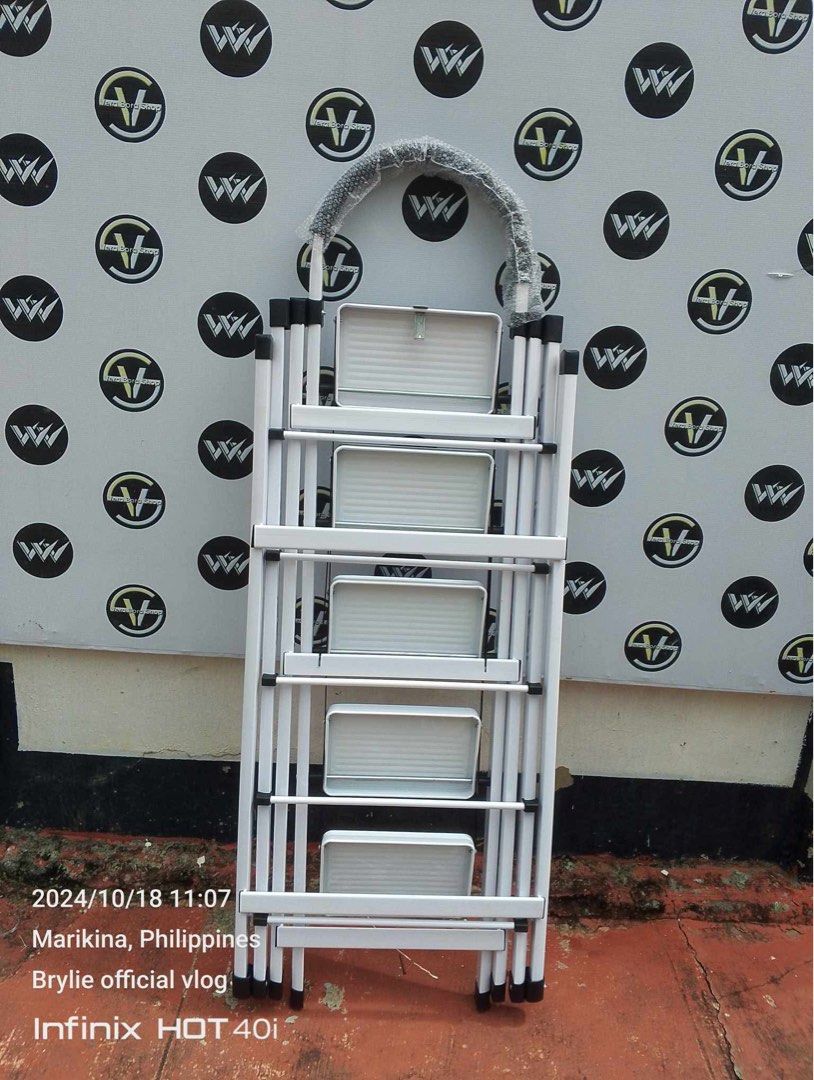 Vb 2in1 ladder and clothes rack (Category: Clothes Drying Rack) located in Manila. Submitted by dolorchris69891 (Listing ID 1375793513, Image 2). Description: 2-in-1 Folding Ladder Clothes Drying Rack A ladder multi-purpose, is a ladder, but also drying clothes rack ~ 'Use the living room as a flower stand." "Bathroom, shelving "Drying rack on the balcony' * Product Description -Climbing to take things, strong support stable, daily use as a ladde