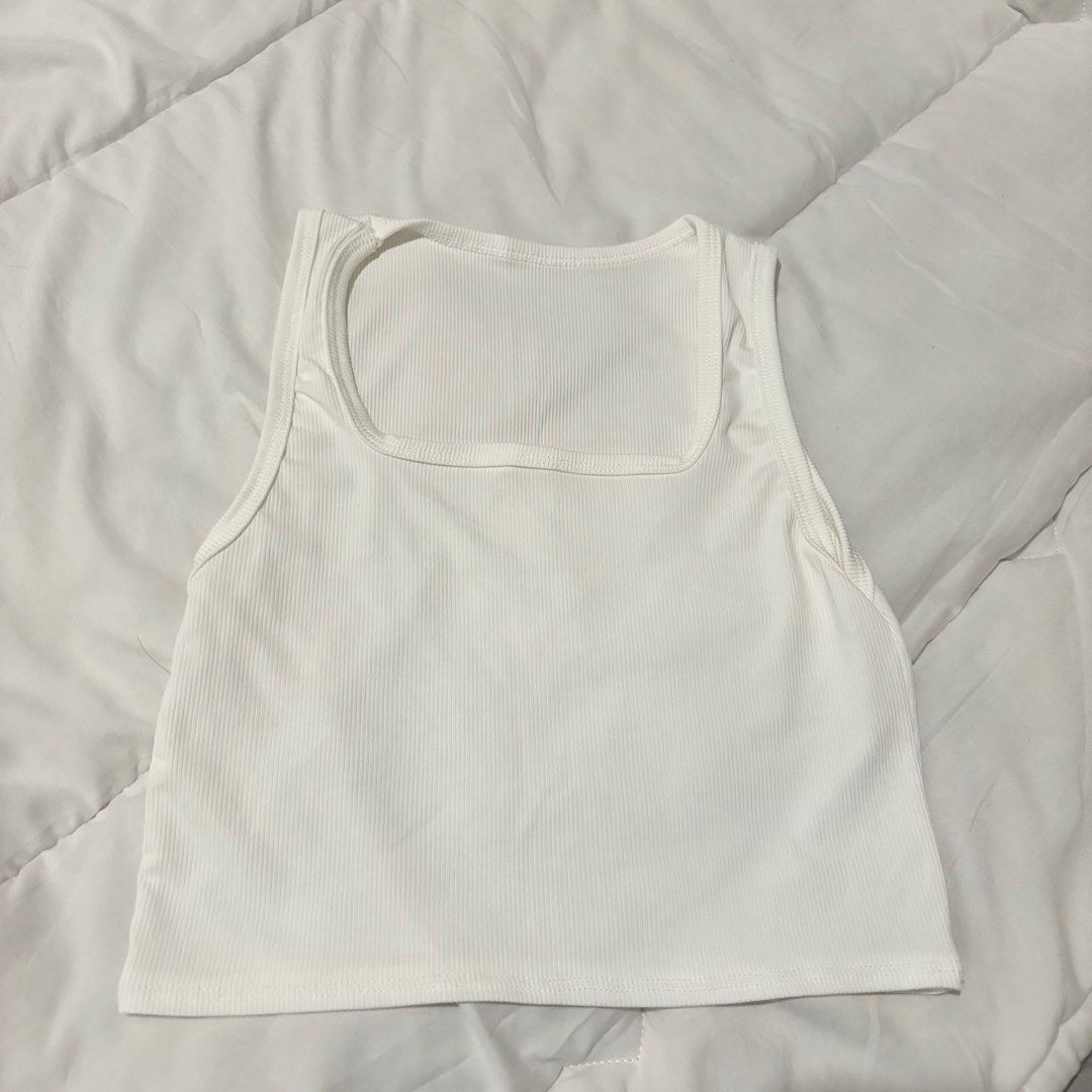White Tank Top (Category: Sleeveless) located in Quezon City. Submitted by __declutterwithme (Listing ID 1375706593, Image 1). Description: .
