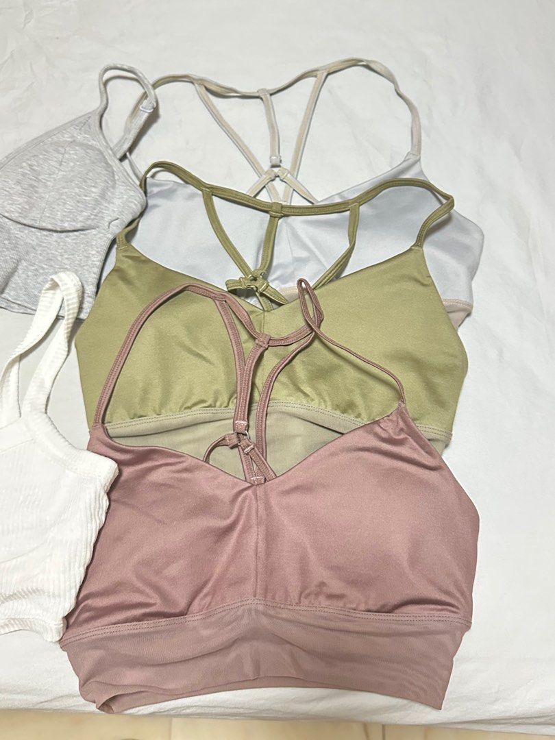 ALO BRAS - XS ( WHITE) (Category: Activewear) located in Singapore. Submitted by wardrobelover (Listing ID 1372630604, Image 3). Description: ALL XS except top left grey (S) All sold except white (without slot for paddings) $5 trackable mail $3 normal mail.