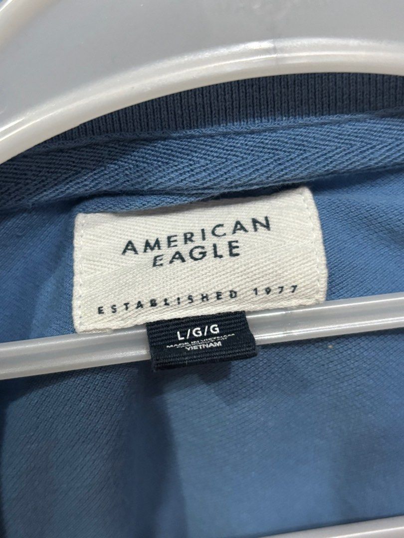 American Eagle Short Sleeve Polo Shirt (Category: Blouses) located in Taguig. Submitted by raninini (Listing ID 1372609337, Image 2). Description: - size L on tag - fits Large.
