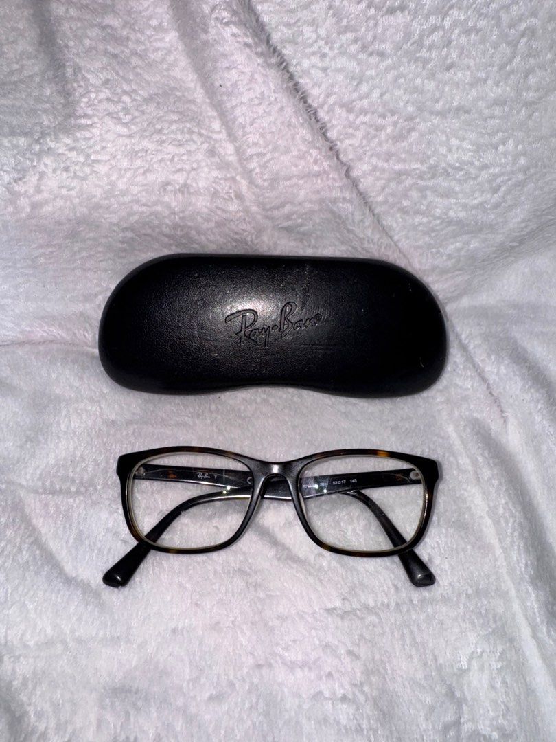 Auth Ray Ban Eyeglasses Matte Havana (Category: Sunglasses & Eyewear) located in Muntinlupa City. Submitted by poisesandthings (Listing ID 1372511205, Image 1). Description: Authentic Ray Ban Matte Havana 53 Comes aling with case Used Nag fade na yung Ray Ban na logo sa right na ear. Bought in Yokohama Japan Will sanitized once purchased RFS: Not gonna use it anymore.