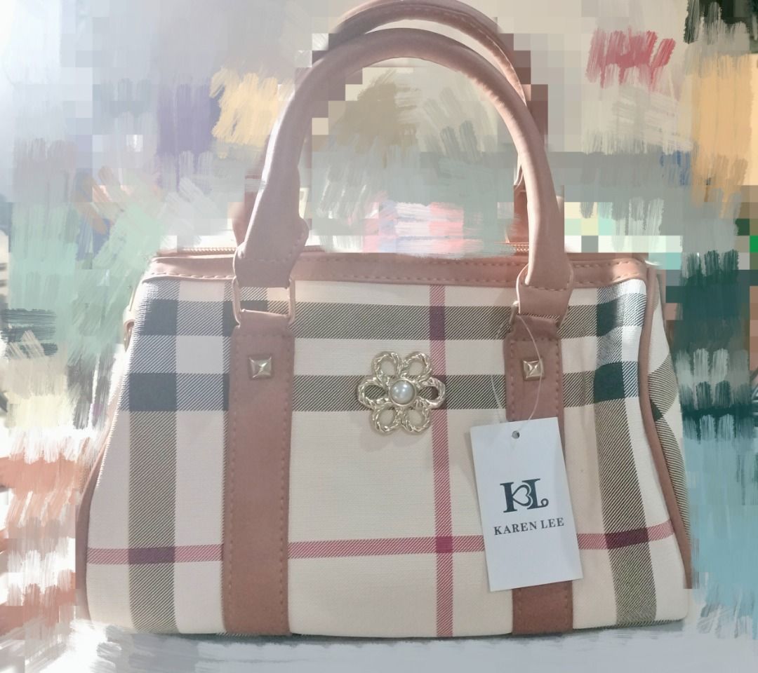 BRAND NEW || Karen Lee (Category: Shoulder Bags) located in Manila. Submitted by rinroo (Listing ID 1372640402, Image 1). Description: RFS: decluttering BRAND NEW Karen Lee Shoulder Bag Handbag Size: L: 7.5" W: 11" Base: 5.7" -gold zipper and hardware - material: hard leather - pu leather straps - inner lining -inner pocket - inner zipper pocket can fit: phone, medium/long wallet, small umbrella PLEASE DO NOT ASK for more pics and please be kind 