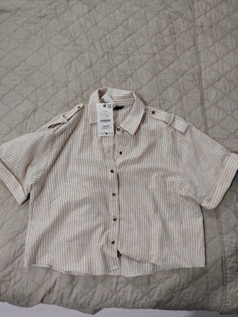 BRAND NEW Zara Blouses (Category: Blouses) located in Pasig City. Submitted by gnowe11k (Listing ID 1372611128, Image 1). Description: Original Zara Brand New Blue Stripe 1,500 Small Oversize Look Beige Stripe Large 2,000.