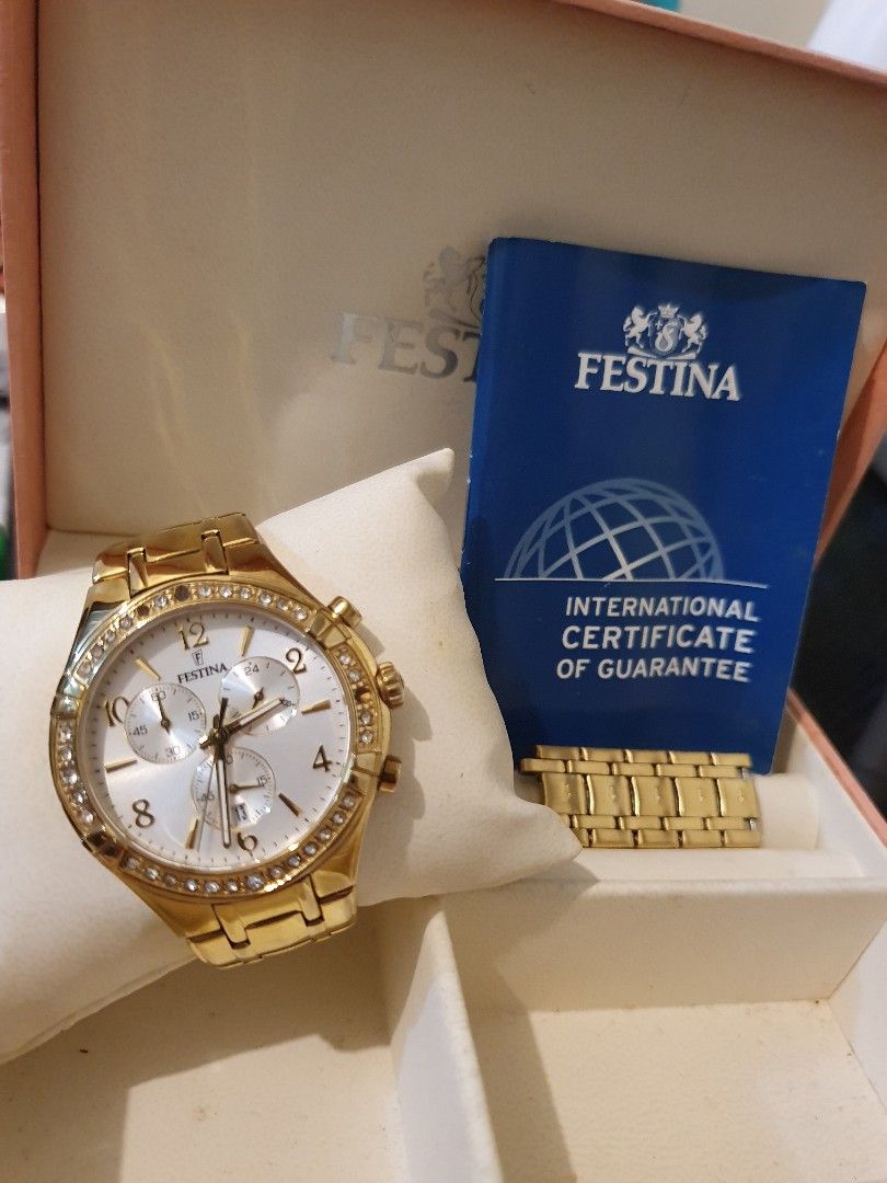 Festina watch F20395 (Category: Women's Watches) located in Taguig. Submitted by rdspreloved (Listing ID 1372585825, Image 2). Description: Festina watch with box with extra links with certificate guarantee. No battery but rest assured this is working. as shown in photos there are 3 missing stone. I brought this year 2020 for 16k. I'm selling this for only 4500 negotiable for sure buyer. selling this for a cheaper price since sayang nman if ma ss