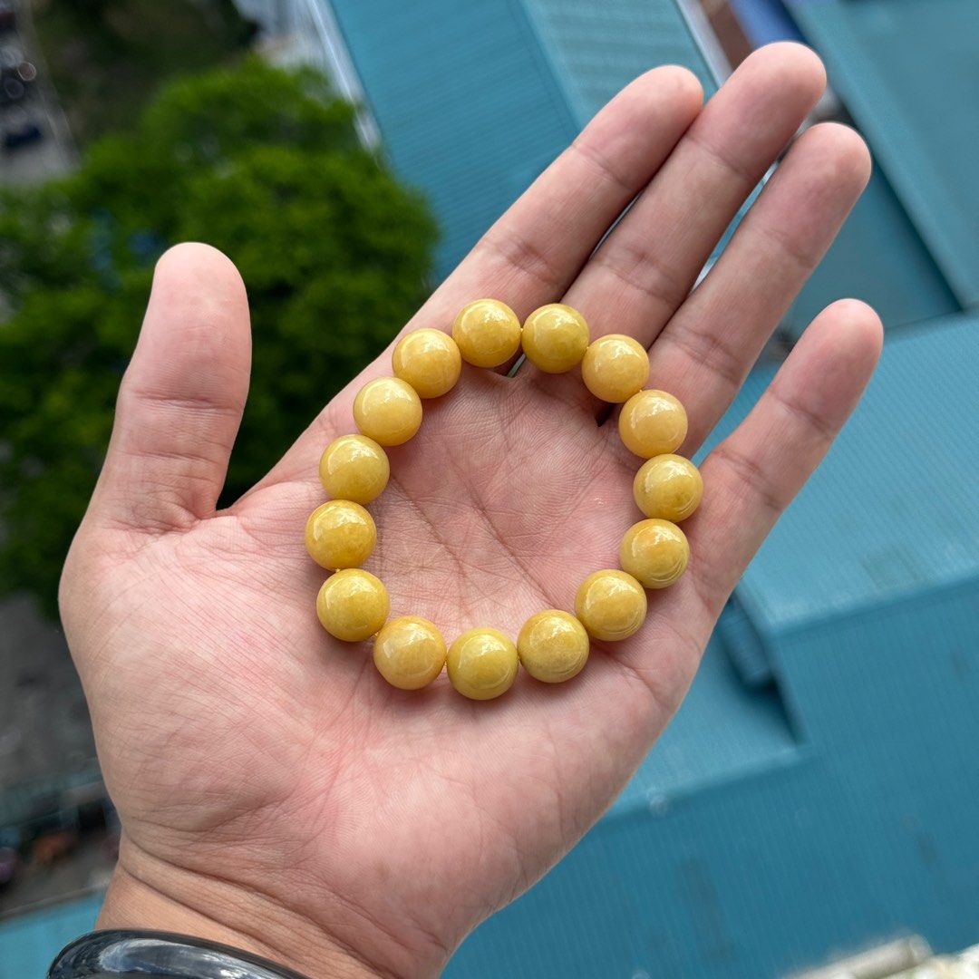 Jade Bracelet Burmese Yellow Natural Type A (Category: Bracelets) located in Pasay City. Submitted by outmonkeys (Listing ID 1372491030, Image 3). Description: Authentic Jadeite Color: Burmese Yellow Bead size: 13mm With certificate and Box Price: 8k negotiable For sure buyer PM me..