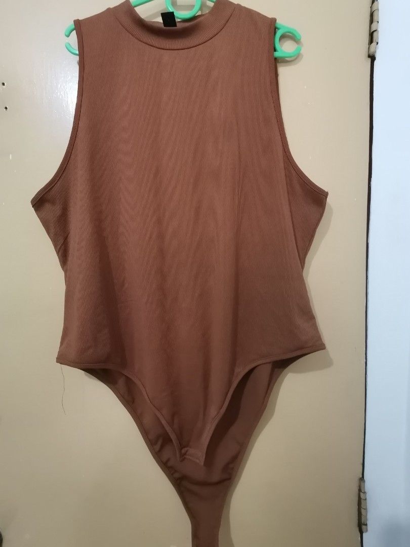 Plus size body suit (Category: Others Tops) located in Caloocan City. Submitted by fpyf193 (Listing ID 1372473447, Image 1). Description: for sale 4xl plus size body suit choco brown used twice only.