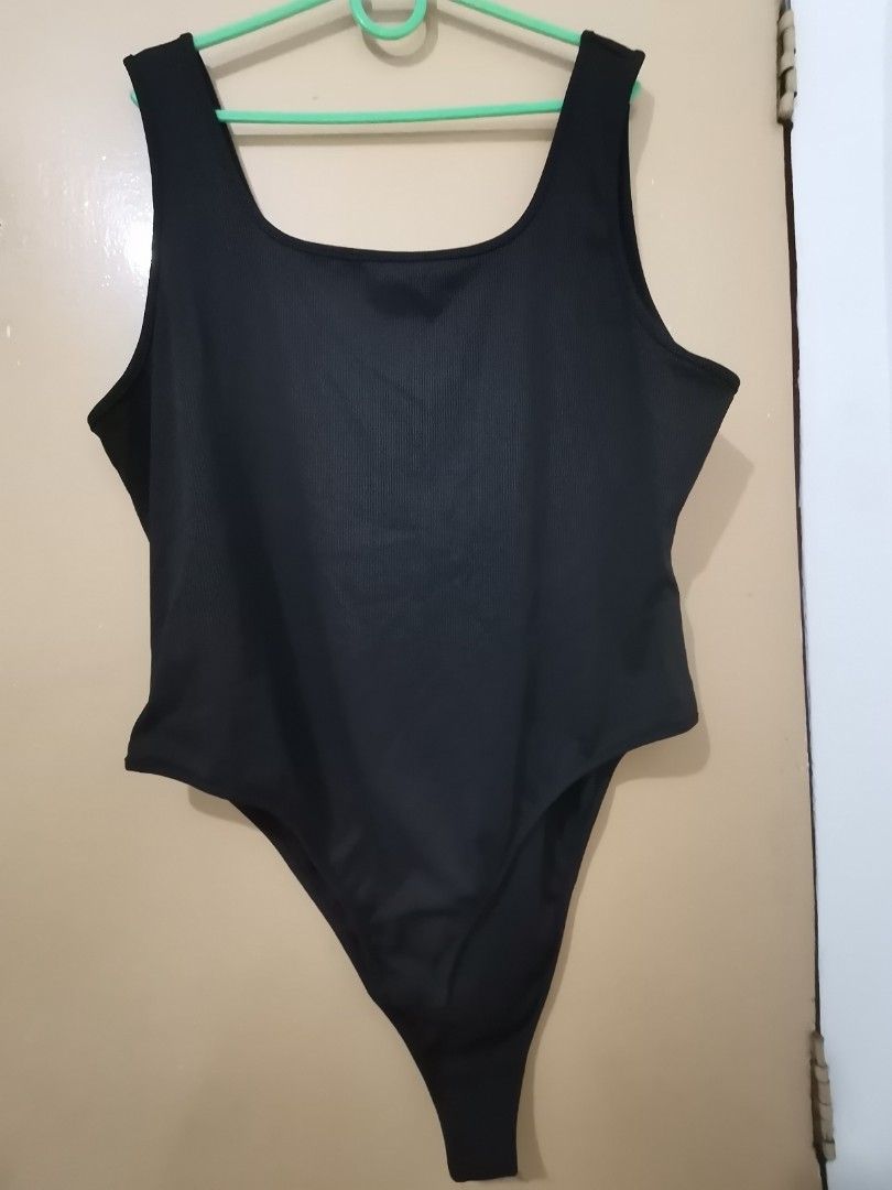 Plus size body suit (Category: Others Tops) located in Caloocan City. Submitted by fpyf193 (Listing ID 1372473581, Image 1). Description: for sale 4xl plus size body suit black never nasuot.