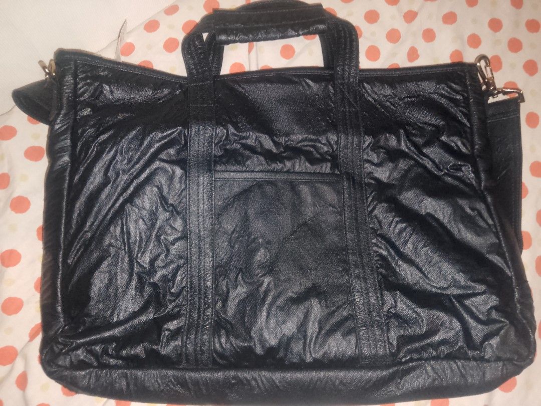 Porter International 10th Anniversary Briefcase (Category: Briefcases) located in Angeles City. Submitted by hauled_up (Listing ID 1372632268, Image 2). Description: 🏷️Porter International 10th Anniversary Briefcase. ✅Zipper , Velcro and Buttons working. ✅ Noticeable Wrinkle across the bag. ✅Still wearable and eye catching. ✅Spacious and can carry ur necessities ✅Fabric condition: 9/10 ✅ Over all condition: 8/10 🚛💵Gcash x Jnt. 💵999 plus sf on