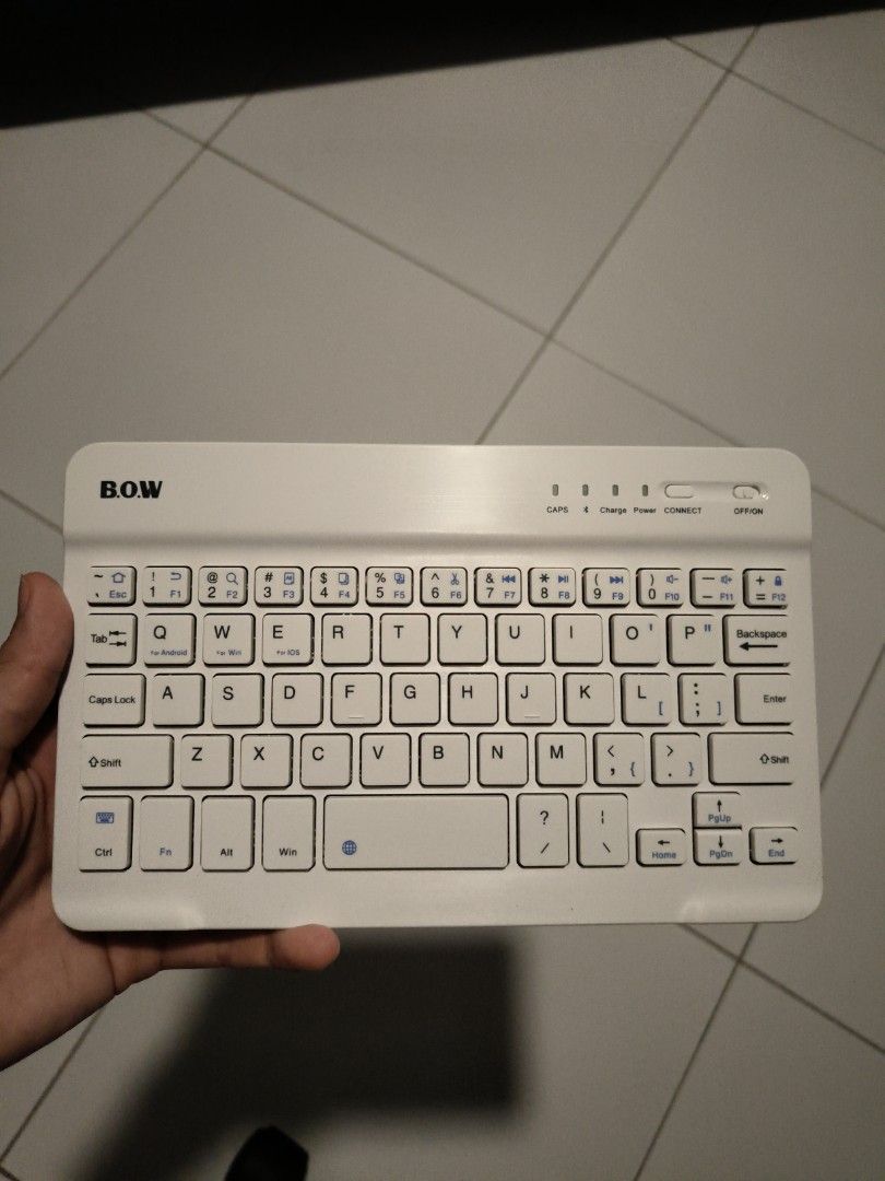 Wireless Tiny Keyboard (Category: Computer Keyboard) located in Singapore. Submitted by justsomeonerandom (Listing ID 1372593042, Image 1). Description: Never used this because I don't need it.